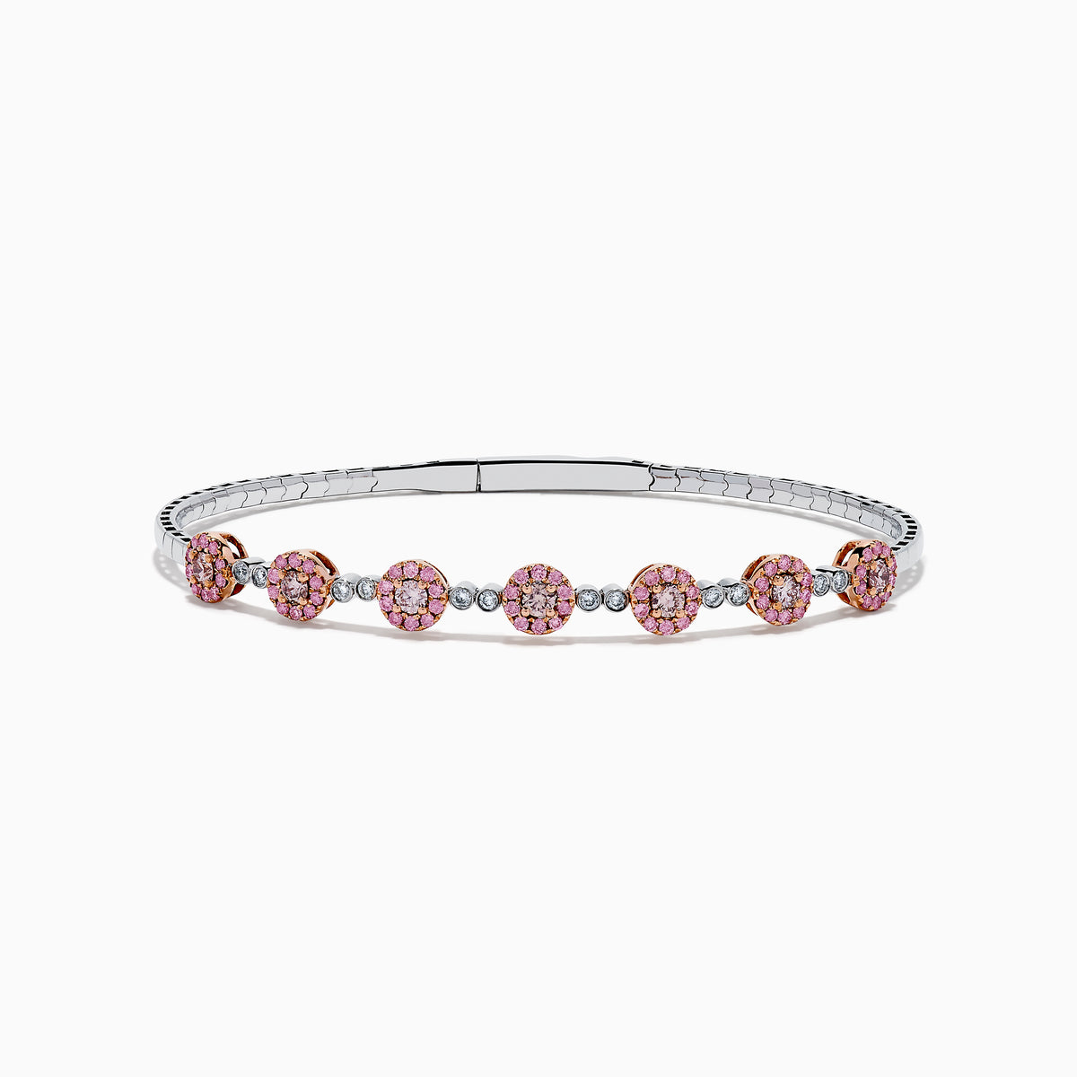 The 14K White and Rose Gold Light Pink and White Diamond Bangle features a sleek silver band with seven clusters of light pink diamonds, each separated by a small white gemstone.