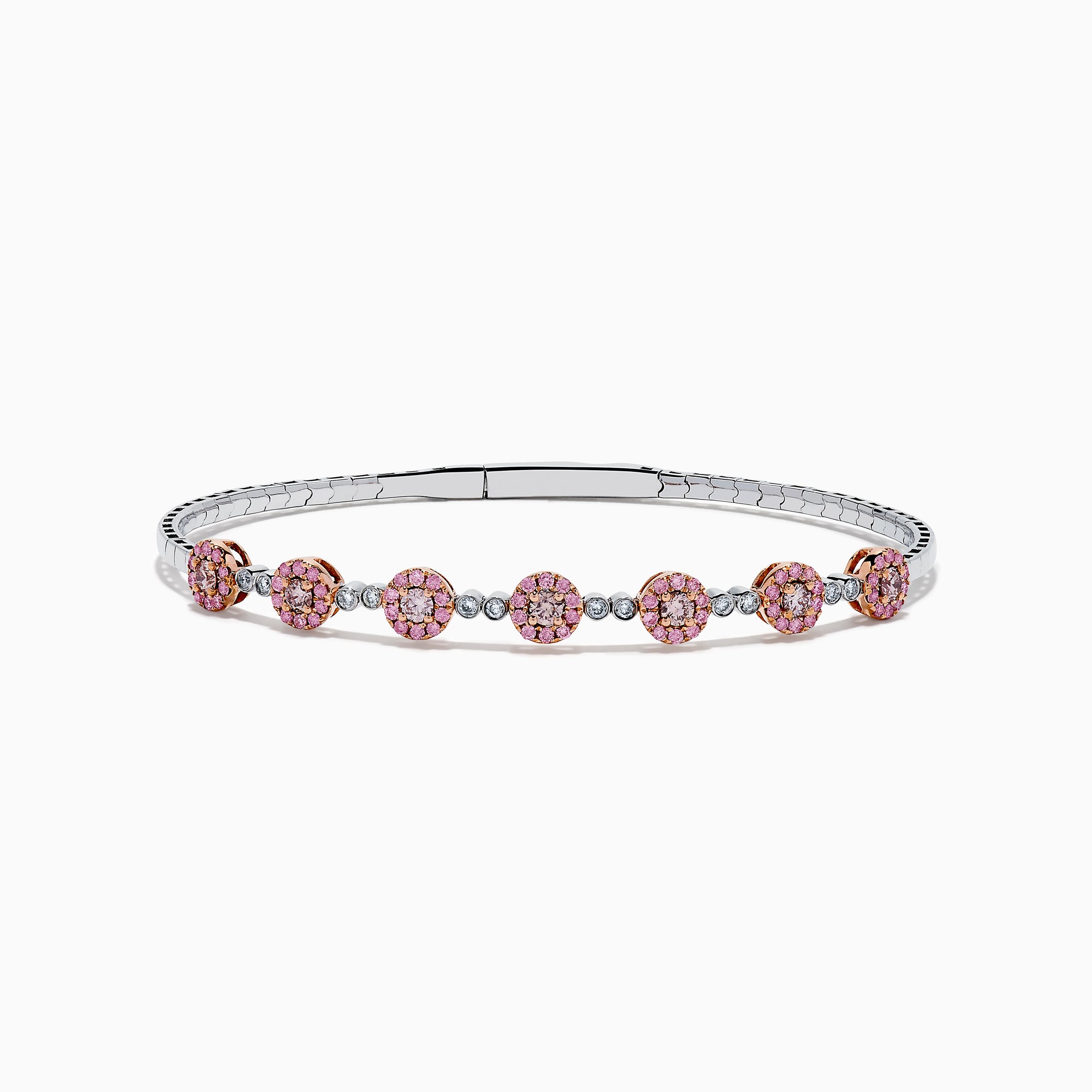 The 14K White and Rose Gold Light Pink and White Diamond Bangle features a sleek silver band with seven clusters of light pink diamonds, each separated by a small white gemstone.