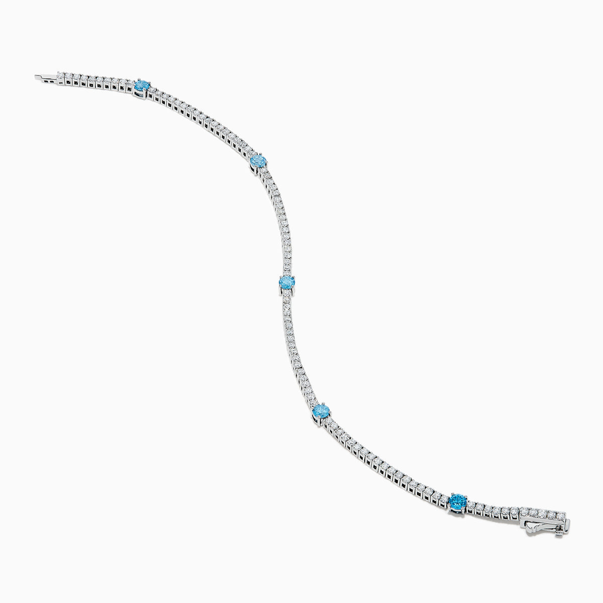 The Lab Grown Blue and White Diamond Tennis Station Bracelet in 14K white gold features clear lab grown diamonds with three evenly spaced round blue gemstones, shown displayed on a white background.