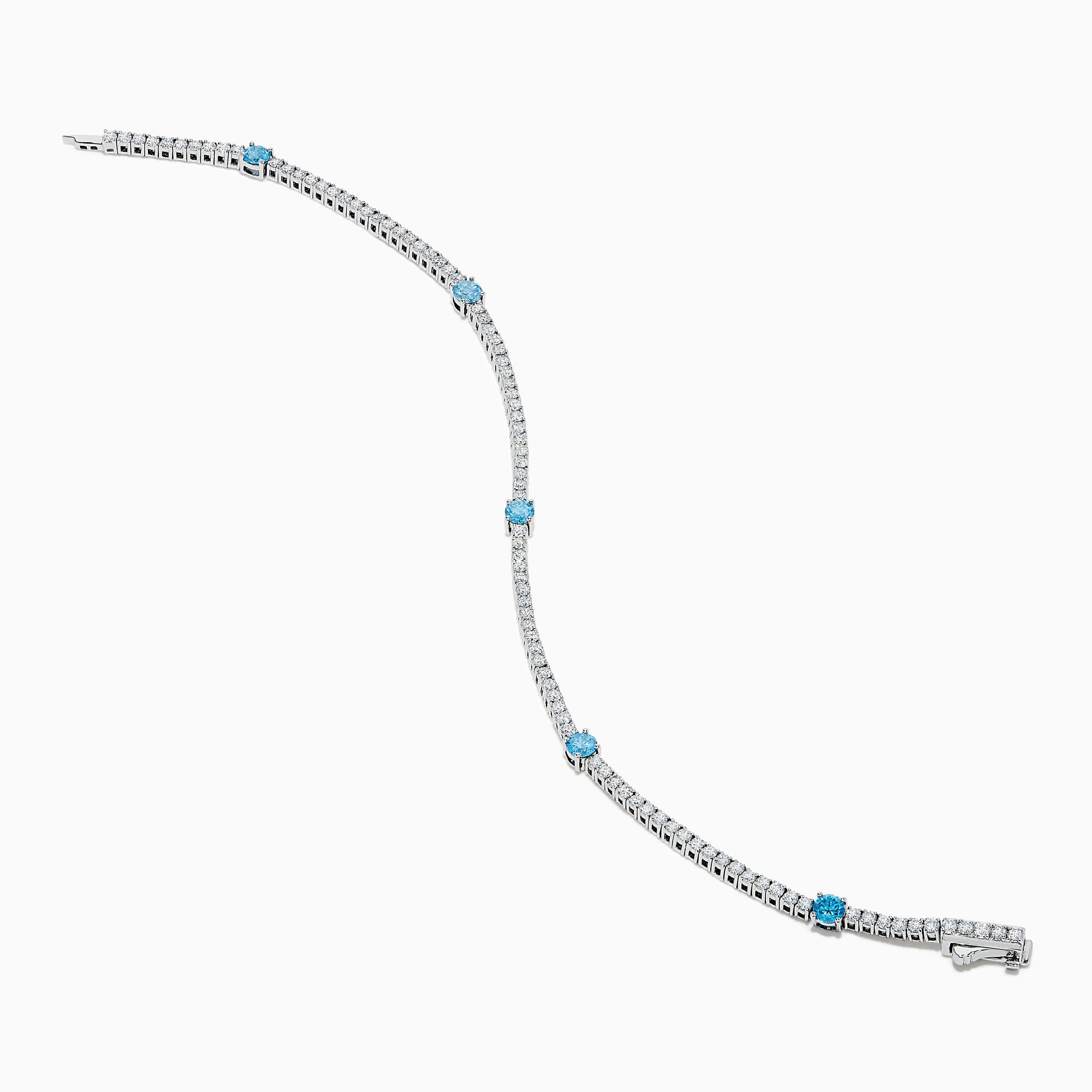 The Lab Grown Blue and White Diamond Tennis Station Bracelet in 14K white gold features clear lab grown diamonds with three evenly spaced round blue gemstones, shown displayed on a white background.