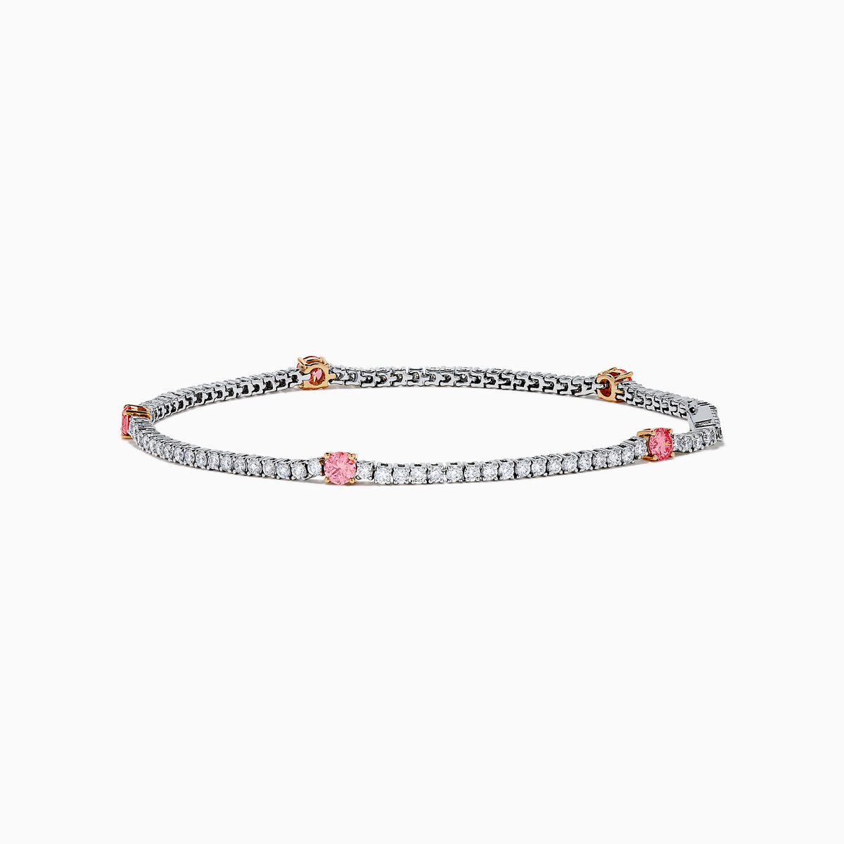 The Lab Grown Pink and White Diamond Tennis Station Bracelet in 14K White Gold features a slim band with sparkling clear stones and three larger pink and white diamonds in rose gold accents, beautifully displayed on a white background.