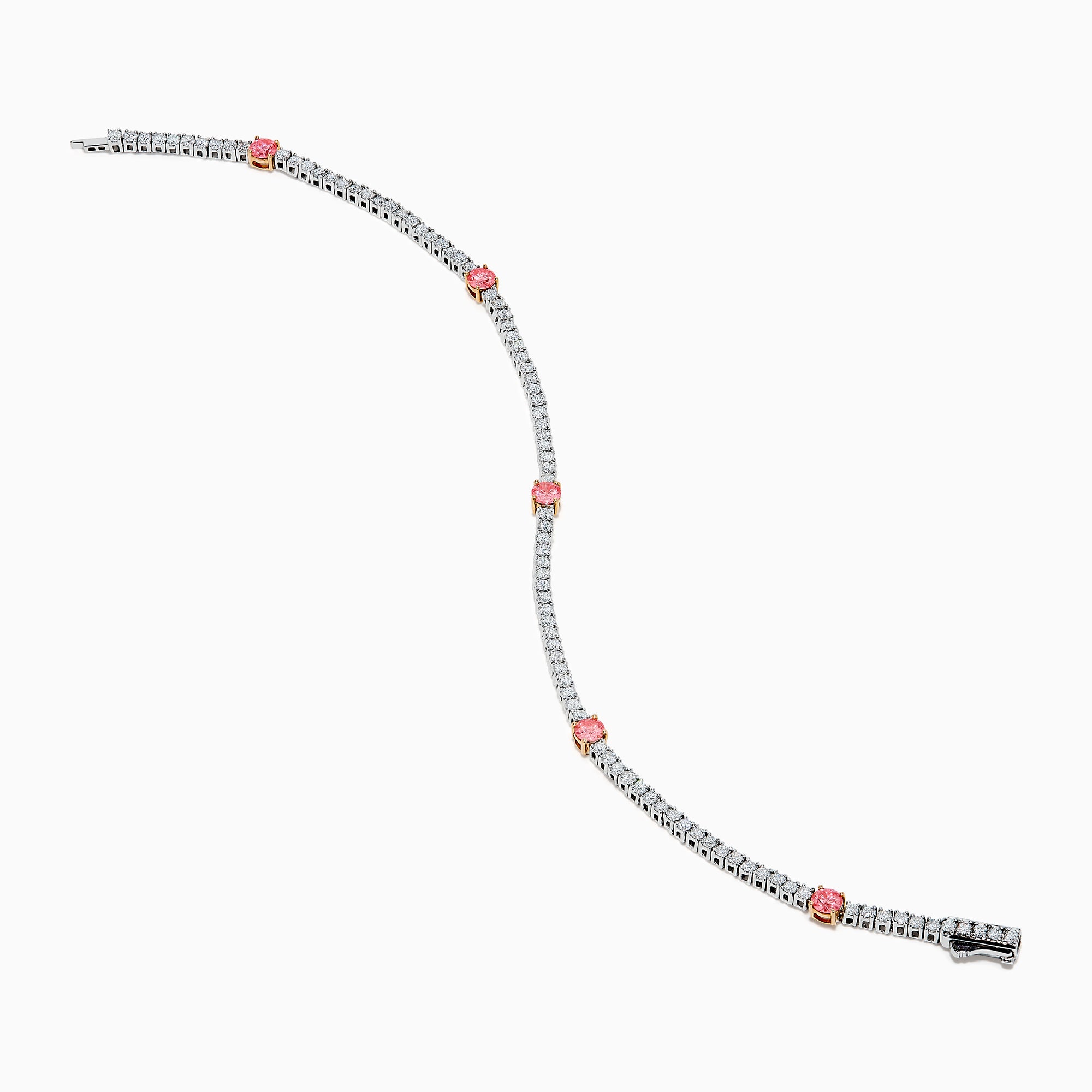 The Lab Grown Pink and White Diamond Tennis Station Bracelet in 14K White Gold features a slim band with sparkling clear stones and three larger pink and white diamonds in rose gold accents, beautifully displayed on a white background.