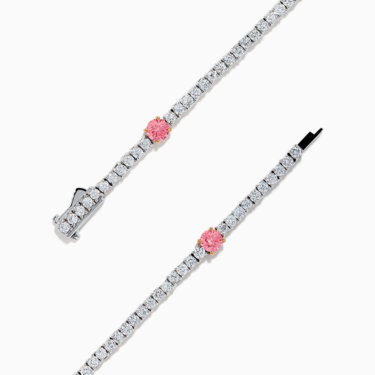 The Lab Grown Pink and White Diamond Tennis Station Bracelet in 14K White Gold features a slim band with sparkling clear stones and three larger pink and white diamonds in rose gold accents, beautifully displayed on a white background.