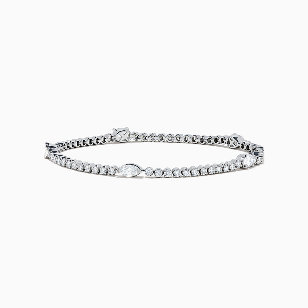 The Lab Grown Diamond Tennis Bracelet in 14K White Gold features a row of round and marquise-cut stones set in a continuous line, creating an elegant and timeless look.