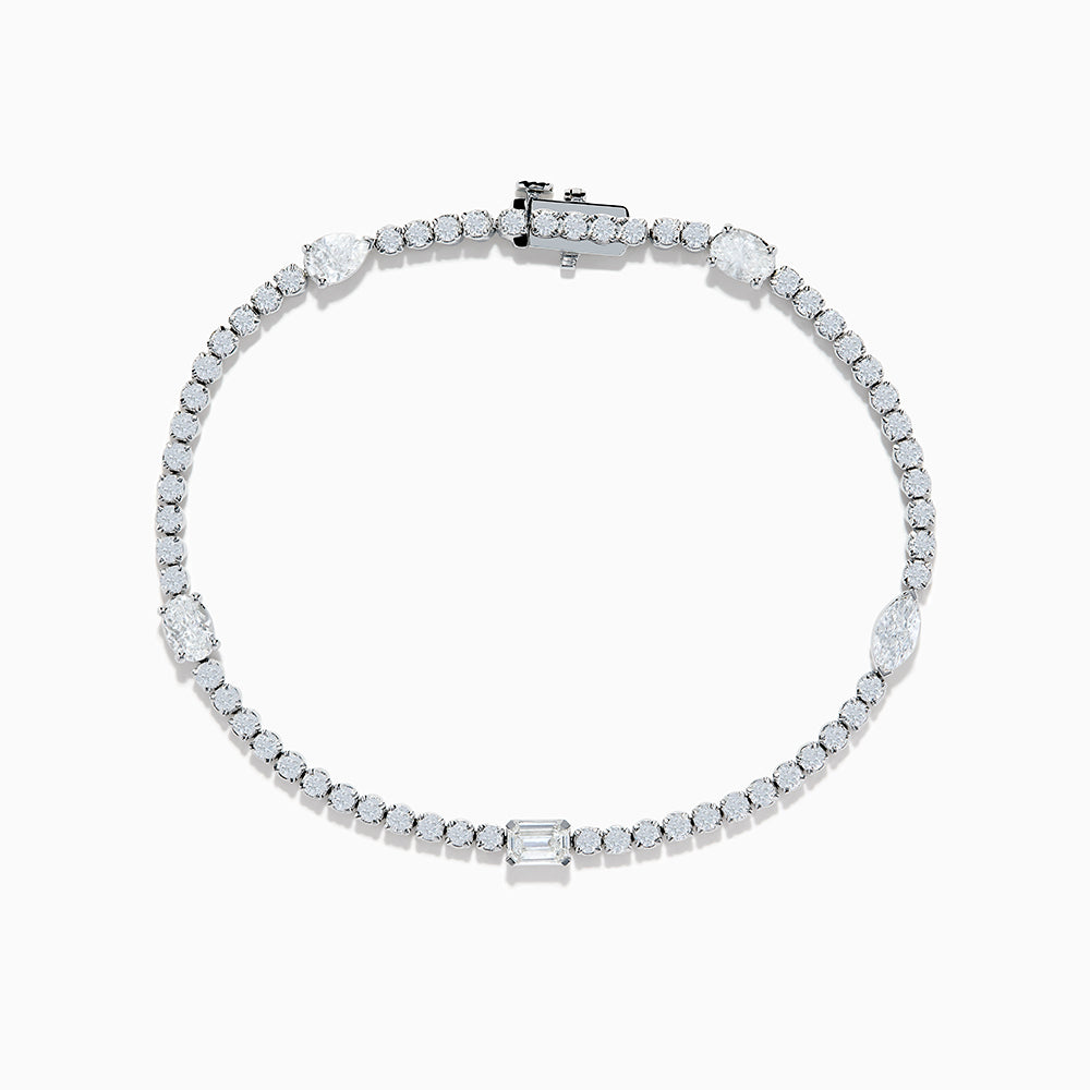 The Lab Grown Diamond Tennis Bracelet in 14K White Gold features a row of round and marquise-cut stones set in a continuous line, creating an elegant and timeless look.