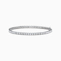 The Lab Grown Emerald Cut Diamond 4.26ct Tennis Bracelet in 14K White Gold features a single row of lab grown diamonds, set in a sleek white gold band and showcased on a plain white background.