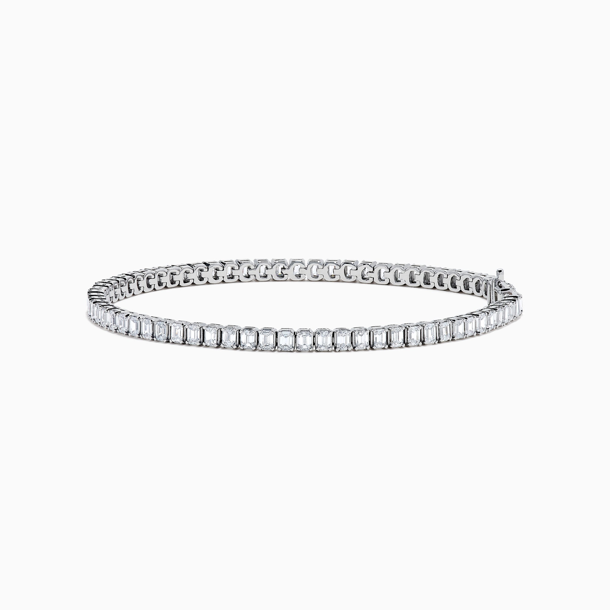 The Lab Grown Emerald Cut Diamond 4.26ct Tennis Bracelet in 14K White Gold features a single row of lab grown diamonds, set in a sleek white gold band and showcased on a plain white background.