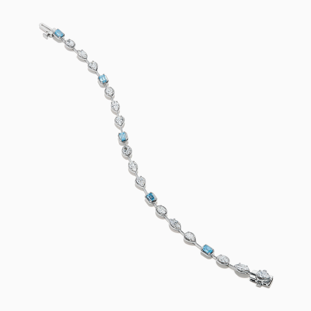 The Lab Grown Blue and White Diamond Multi Shape Tennis Bracelet in 14K White Gold showcases alternating oval, round, and emerald-cut lab-grown blue and white diamonds against a white background.