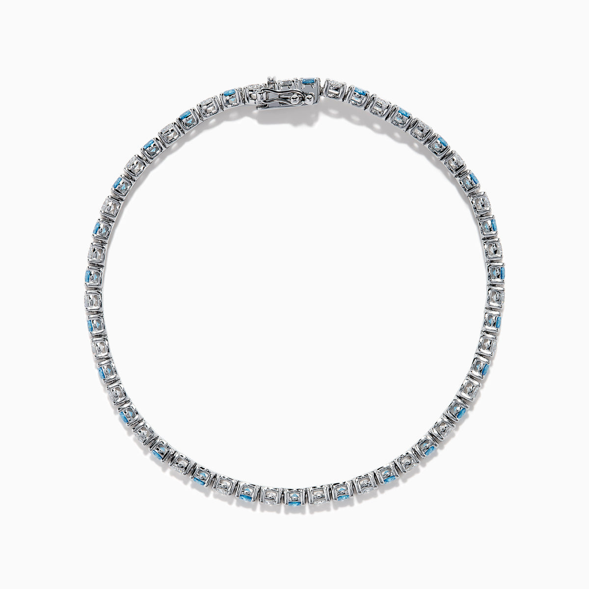 The Lab Grown Blue and White Diamond Tennis Bracelet in 14K White Gold features alternating round blue and white diamonds set in a continuous line, shown against a white background.