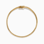 The Lab Grown Diamond 2.95ct Tennis Bracelet in 14K Yellow Gold showcases a continuous line of round lab grown diamonds in prong settings, beautifully displayed against a plain white background.