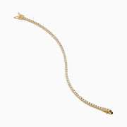 The Lab Grown Diamond 2.95ct Tennis Bracelet in 14K Yellow Gold showcases a continuous line of round lab grown diamonds in prong settings, beautifully displayed against a plain white background.