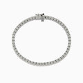 The 925 Sterling Silver Diamond Tennis Bracelet features a continuous row of round, sparkling diamonds set in sterling silver, displayed on a white background.