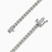 The 925 Sterling Silver Diamond Tennis Bracelet features a continuous row of round, sparkling diamonds set in sterling silver, displayed on a white background.
