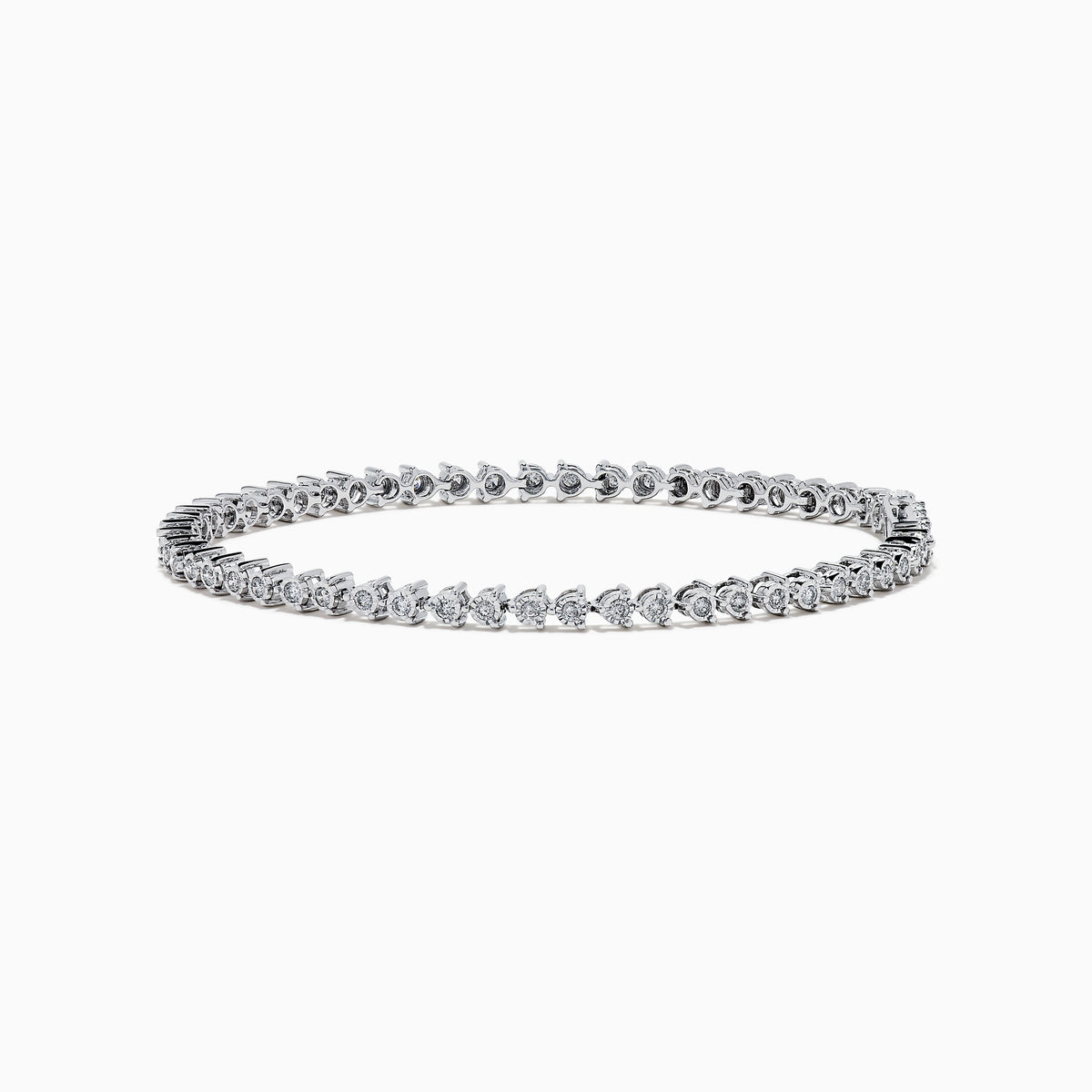 The 14K White Gold Diamond Miracle Setting Tennis Bracelet features a continuous line of round-cut diamonds set in white gold, displayed against a plain white background.