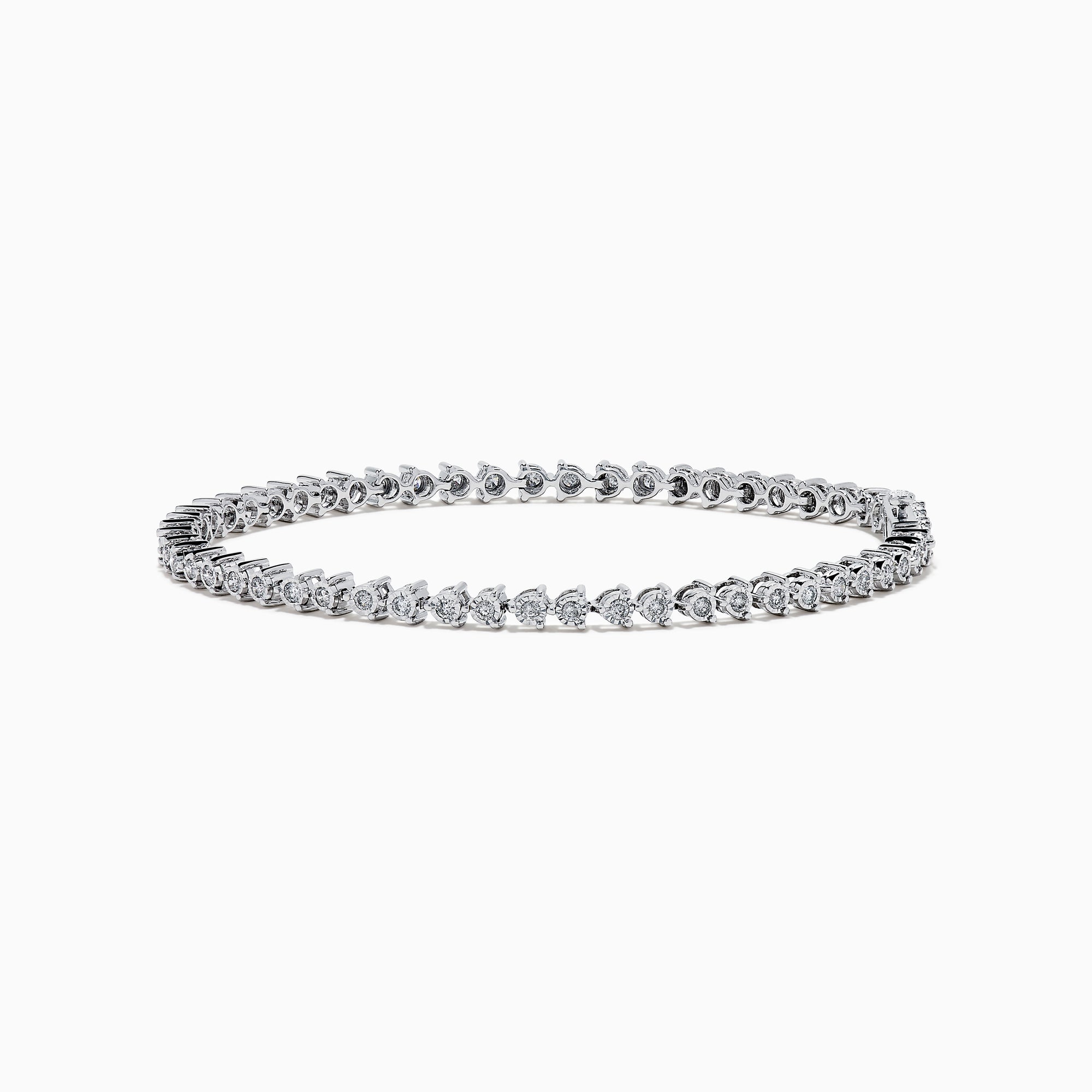 The 14K White Gold Diamond Miracle Setting Tennis Bracelet features a continuous line of round-cut diamonds set in white gold, displayed against a plain white background.