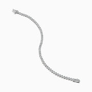 The 14K White Gold Diamond Miracle Setting Tennis Bracelet features a continuous line of round-cut diamonds set in white gold, displayed against a plain white background.