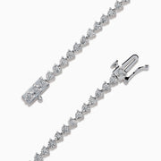 The 14K White Gold Diamond Miracle Setting Tennis Bracelet features a continuous line of round-cut diamonds set in white gold, displayed against a plain white background.