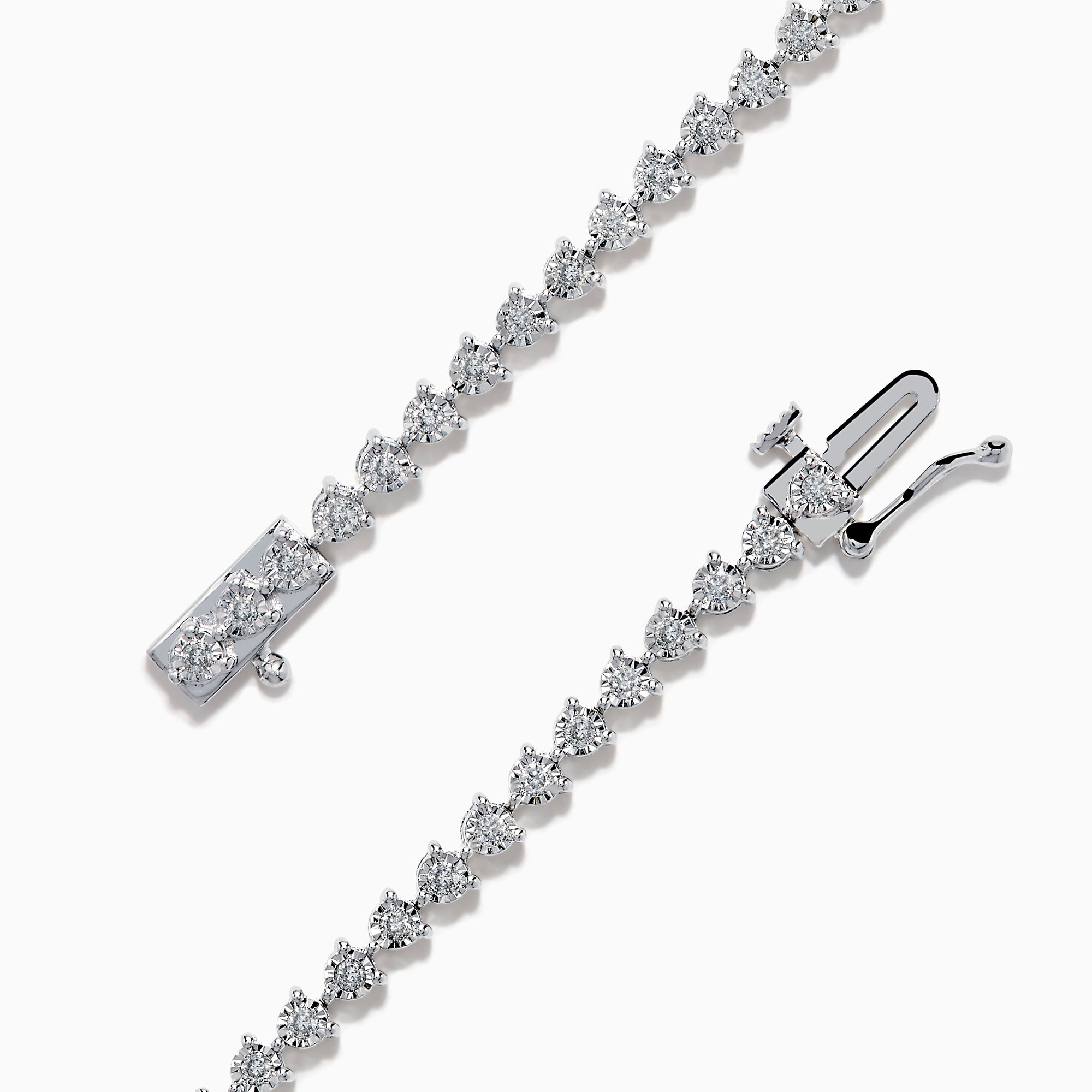 The 14K White Gold Diamond Miracle Setting Tennis Bracelet features a continuous line of round-cut diamonds set in white gold, displayed against a plain white background.