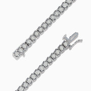 The 925 Sterling Silver Diamond Tennis Bracelet showcases a row of round-cut diamonds set in sleek sterling silver, elegantly displayed against a white background.