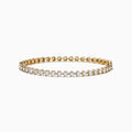 The Pave Classica 14K Two-Tone Gold Diamond Tennis Bracelet 1.95 TCW features evenly spaced round diamonds, showcased on a plain white background.