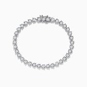 The Pave Classica 14K White Gold Diamond Bracelet features a single row of round, sparkling white diamonds in an oval shape, beautifully set against a white background.