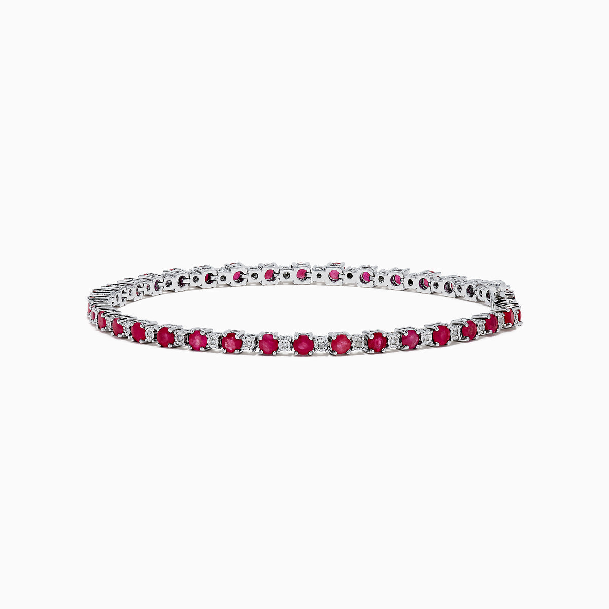 The 925 Sterling Silver Ruby and Diamond Tennis Bracelet features a continuous row of round rubies and diamonds set in individual prongs, forming an elegant circle for timeless sophistication.