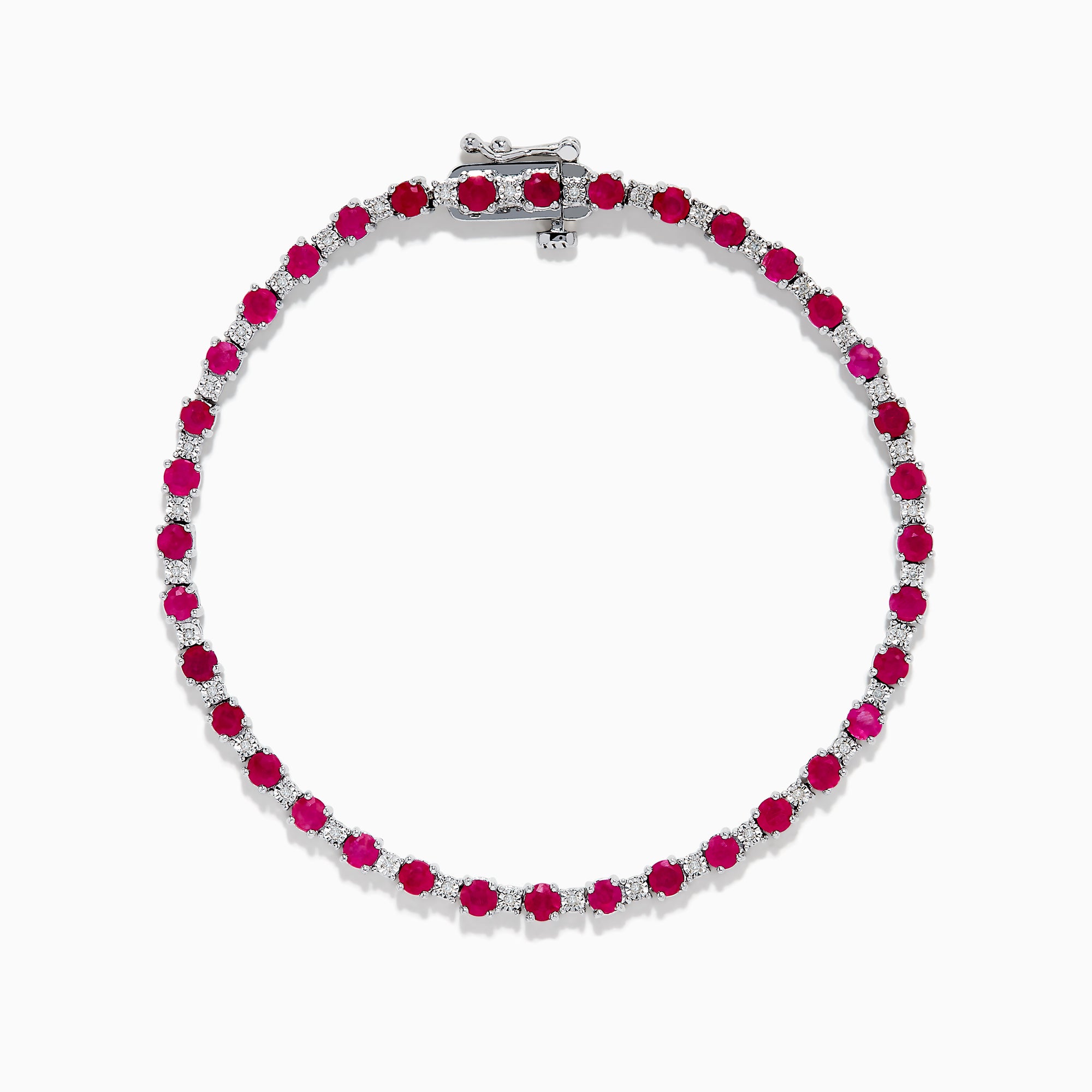 The 925 Sterling Silver Ruby and Diamond Tennis Bracelet features a continuous row of round rubies and diamonds set in individual prongs, forming an elegant circle for timeless sophistication.