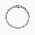 The 925 Silver Diamond Tennis Bracelet showcases a continuous line of sparkling diamond accents in prong settings, secured with a clasp and beautifully displayed against a white background.