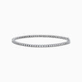 The 14K White Gold Diamond Tennis Bracelet 0.98 TCW features a slender band adorned with a continuous line of sparkling diamonds, beautifully displayed on a white background.