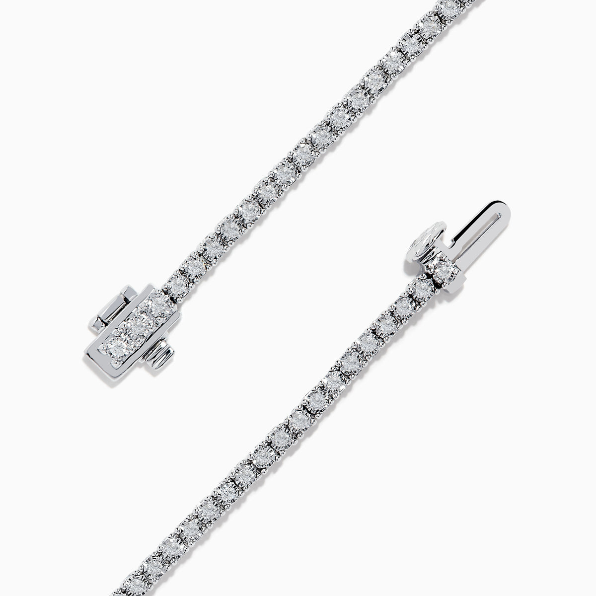 The 14K White Gold Diamond Tennis Bracelet 0.98 TCW features a slender band adorned with a continuous line of sparkling diamonds, beautifully displayed on a white background.