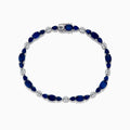 The Royale Bleu 14K White Gold Blue Sapphire and Diamond Bracelet features alternating oval blue sapphires and round diamonds set in a loop with a decorative clasp.