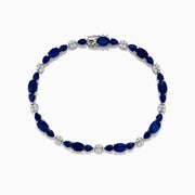 The Royale Bleu 14K White Gold Blue Sapphire and Diamond Bracelet features alternating oval blue sapphires and round diamonds set in a loop with a decorative clasp.