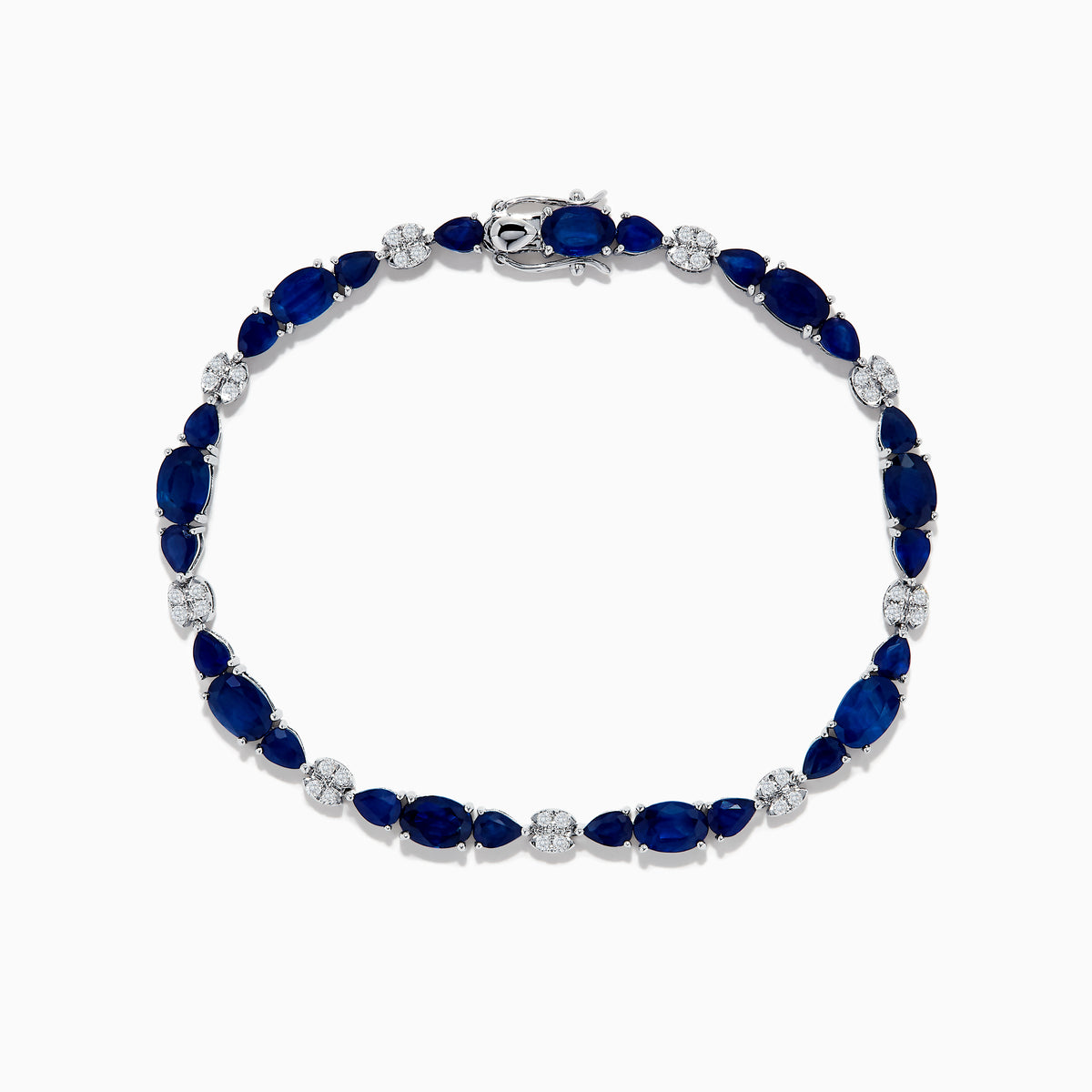 The Royale Bleu 14K White Gold Blue Sapphire and Diamond Bracelet features alternating oval blue sapphires and round diamonds set in a loop with a decorative clasp.