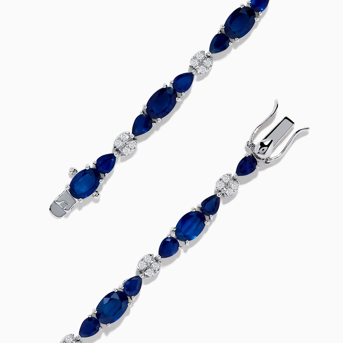The Royale Bleu 14K White Gold Blue Sapphire and Diamond Bracelet features alternating oval blue sapphires and round diamonds set in a loop with a decorative clasp.