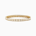 The Classique 14k Yellow Gold Diamond Tennis Bracelet features two rows of sparkling diamonds totaling 2.65 TCW, reminiscent of a classic tennis bracelet, beautifully displayed against a white background.
