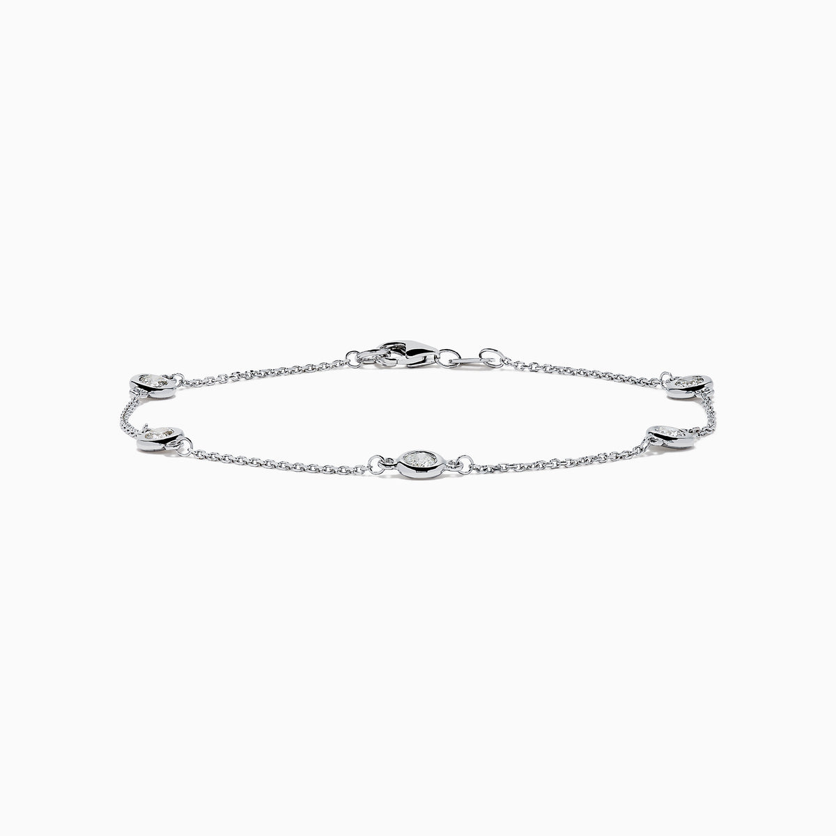 The 14K White Gold Bezel Diamond Bezel Bracelet features five round diamond-like stones in bezel settings, evenly spaced along a delicate chain, and secured with a lobster clasp.