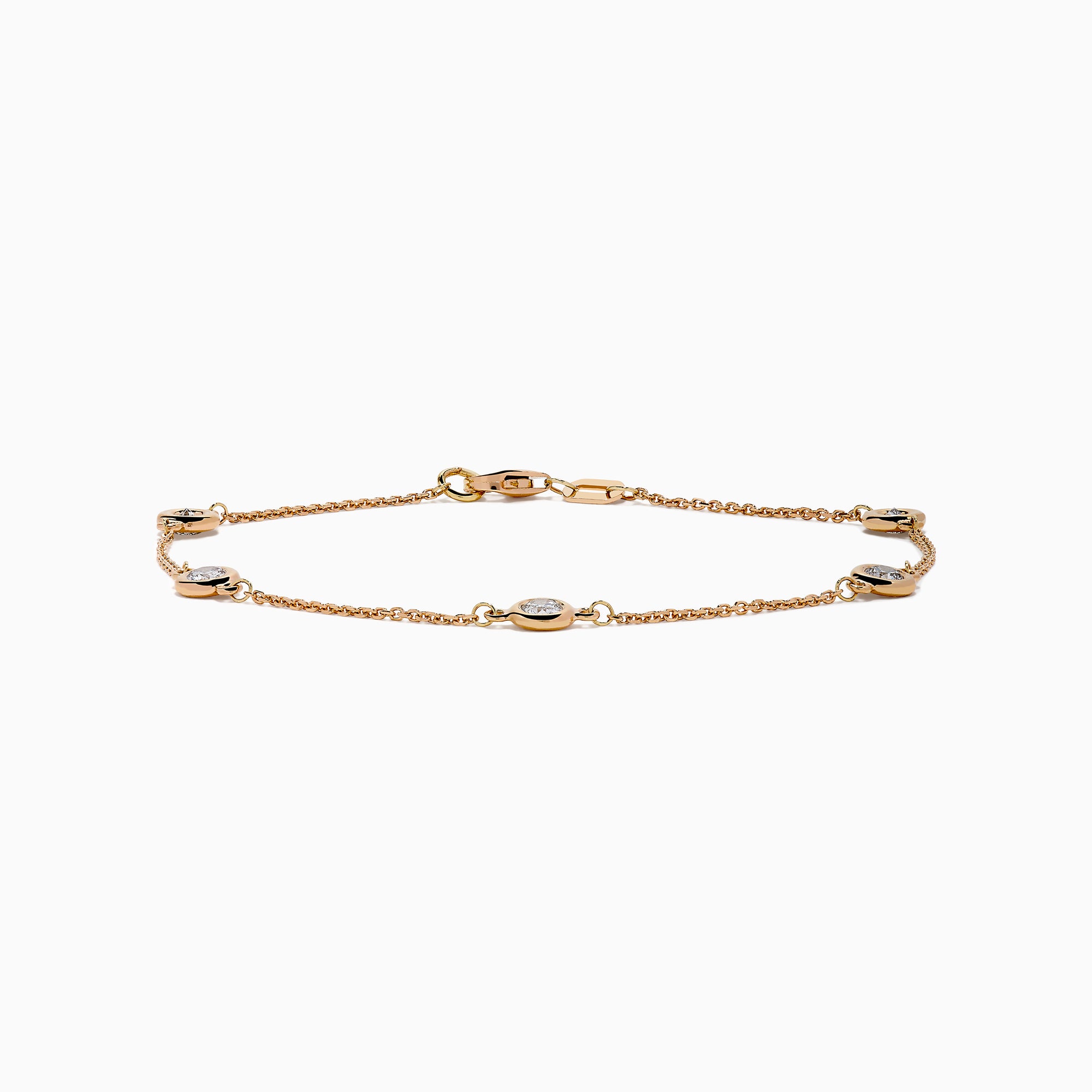 The Pave Rose 14K Rose Gold Diamond Station Bracelet features five round diamonds in gold bezels on a delicate chain with a lobster clasp, shown on a white background.