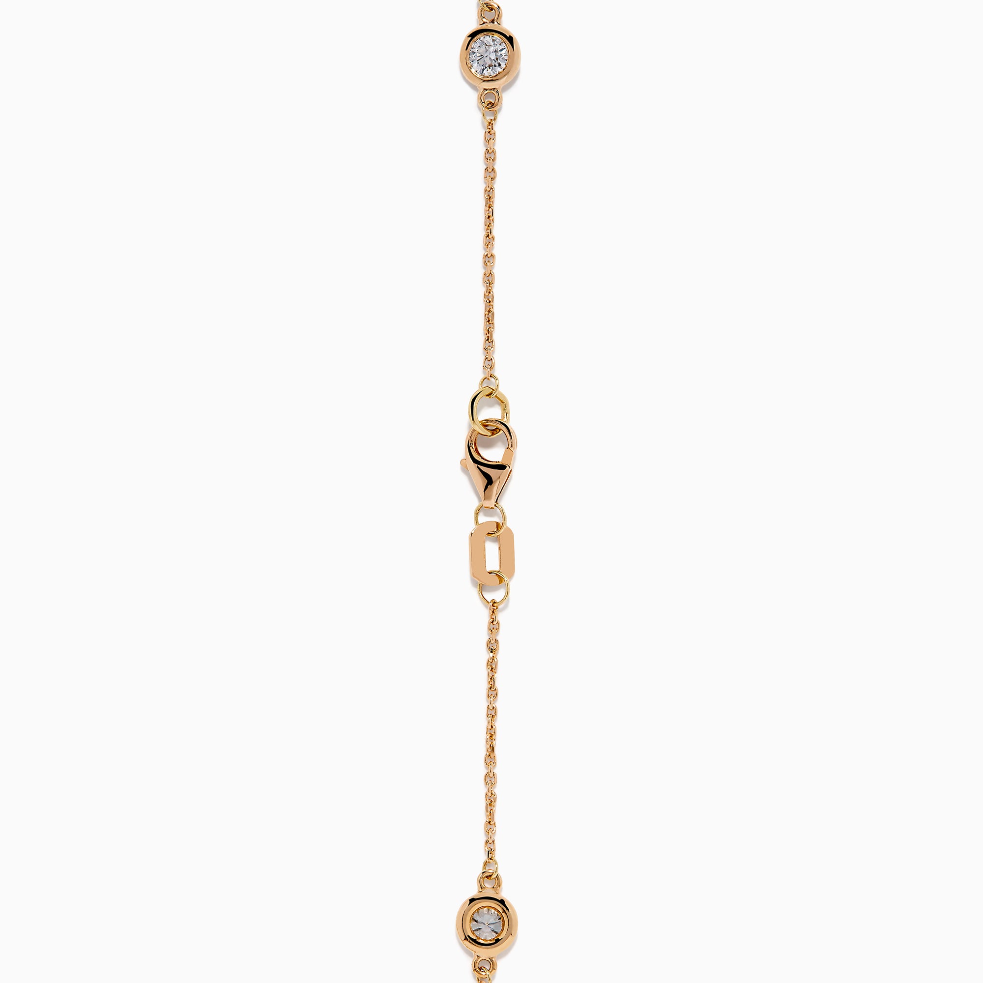 The Pave Rose 14K Rose Gold Diamond Station Bracelet features five round diamonds in gold bezels on a delicate chain with a lobster clasp, shown on a white background.