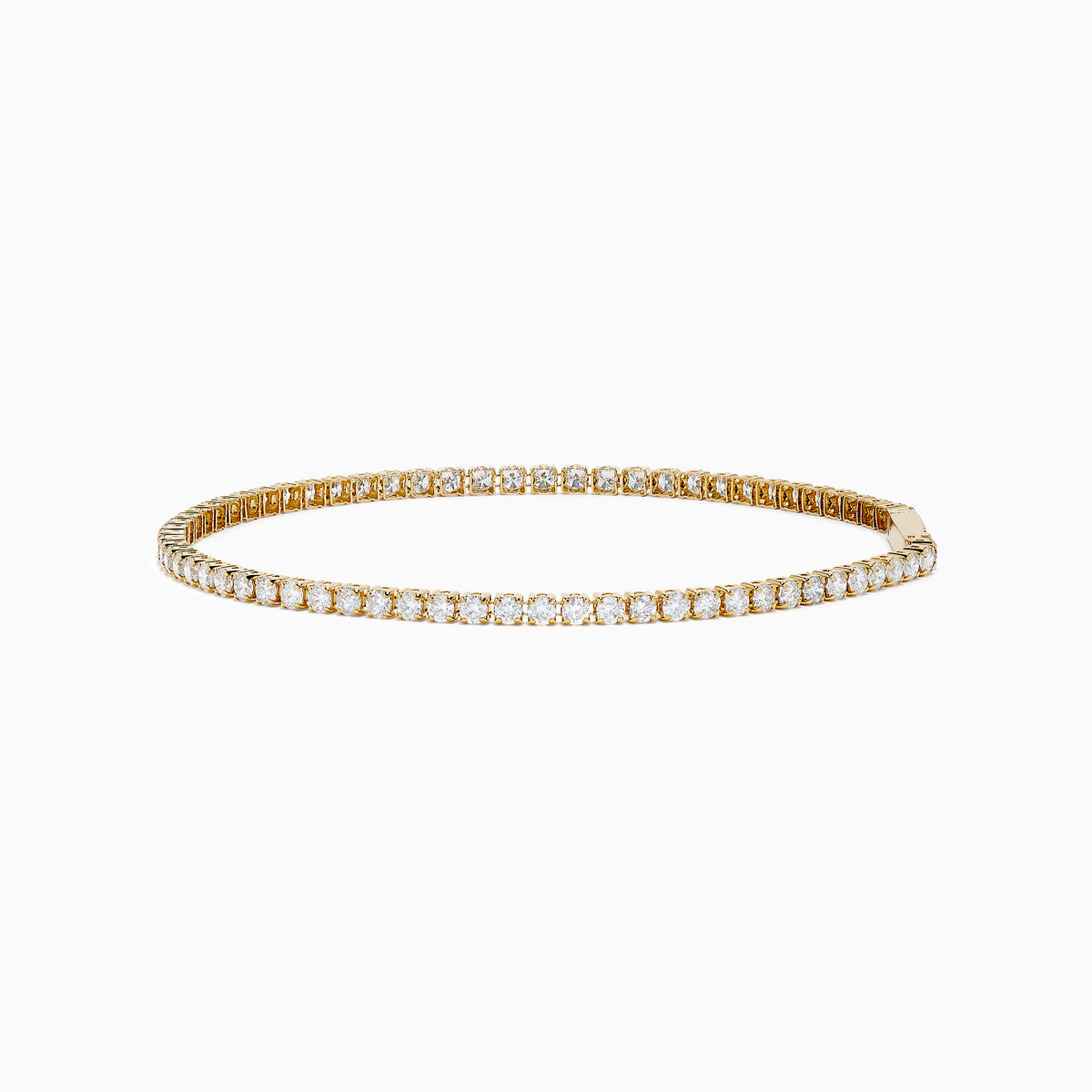 The 14K Yellow Gold Diamond Tennis Bracelet 2.33TCW, featuring a continuous row of sparkling round white diamonds, is elegantly shown on a simple white background.