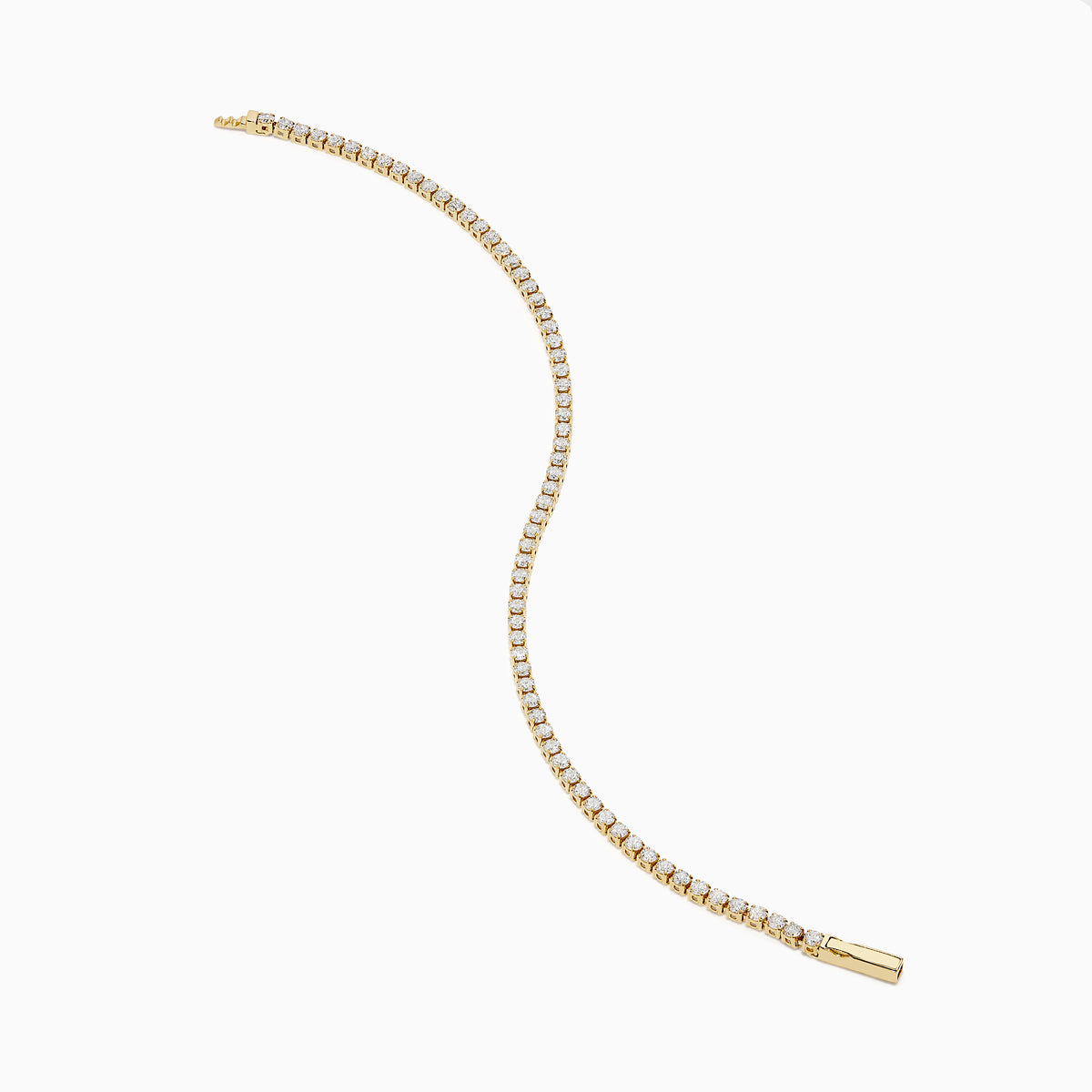 The 14K Yellow Gold Diamond Tennis Bracelet 2.33TCW, featuring a continuous row of sparkling round white diamonds, is elegantly shown on a simple white background.