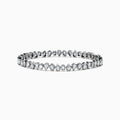 The 14K White Gold Fancy Cut Diamond Miracle Set Bracelet features alternating oval, pear, and emerald-cut diamonds in a continuous pattern against a white gold background.