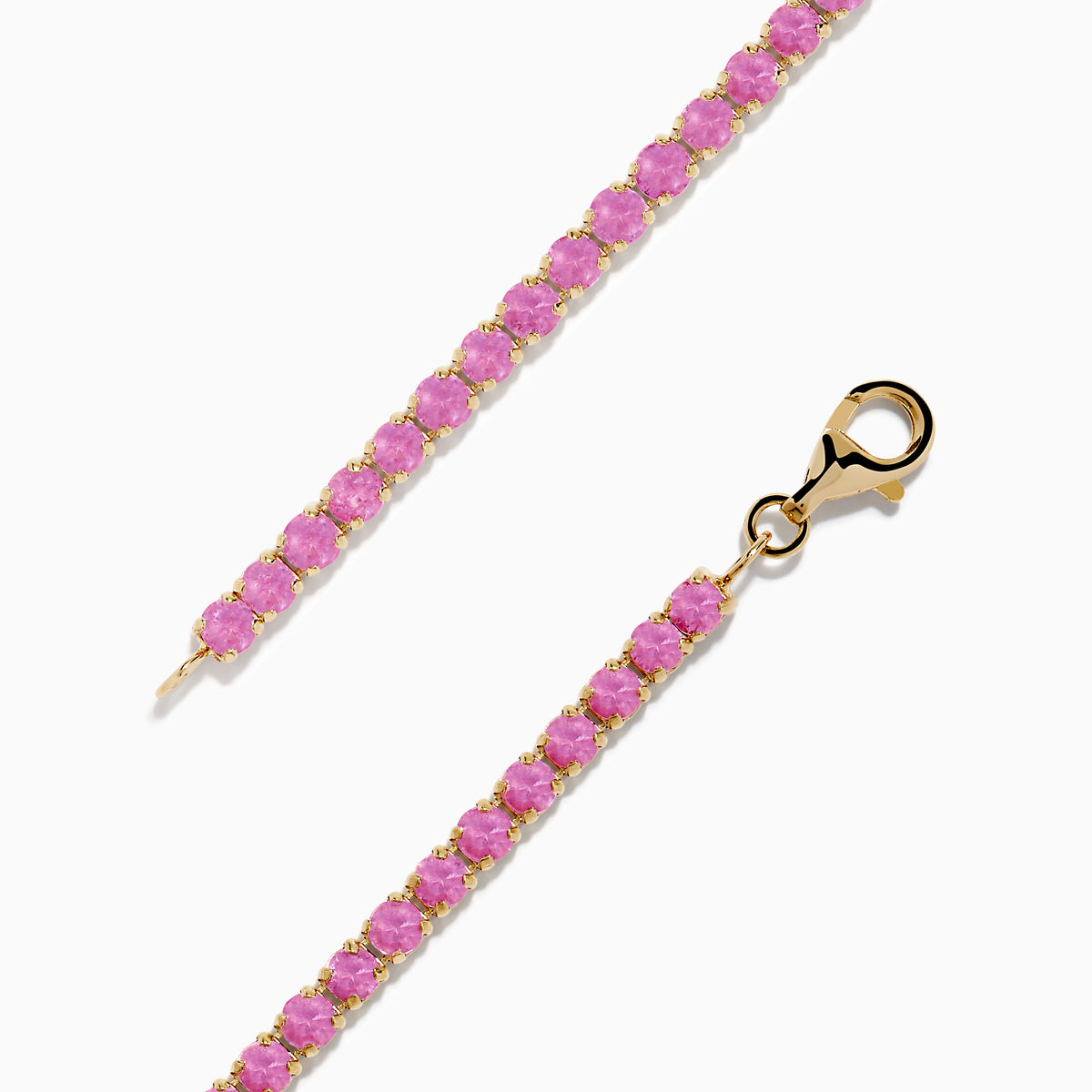 The 14K Yellow Gold Pink Sapphire Tennis Bracelet features small round pink sapphires in a continuous yellow gold setting with a gold clasp, displayed on a white background.