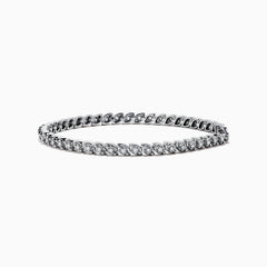 The Pave Classica 14K White Gold Diamond Tennis Bracelet features 0.87 TCW of sparkling diamonds in a sleek, elegant design that adds timeless sophistication to any look.