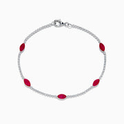 The Ruby Royale 14K White Gold Ruby and Diamond Tennis Bracelet features a thin strand of white diamonds with five marquise-shaped rubies and a silver clasp, displayed on a white background.