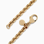 Mens 14K yellow gold chain bracelet, 8.25 long, featuring rectangular links, a lobster clasp, and a small round charm near the clasp, displayed on a white background.