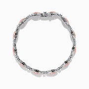 The 18K Two-Tone Gold Pink and White Diamond Tennis Bracelet features alternating teardrop-shaped settings with pink and white diamonds accented by small clear stones, shown on a white background.