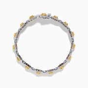 The Canare 18K Two Tone Gold White & Yellow Diamond Gold Bracelet showcases square links with clusters of white and yellow diamonds, offering a geometric and elegant design.