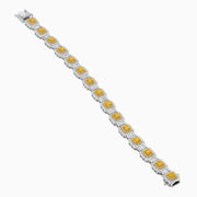 The Canare 18K Two Tone Gold White & Yellow Diamond Gold Bracelet showcases square links with clusters of white and yellow diamonds, offering a geometric and elegant design.