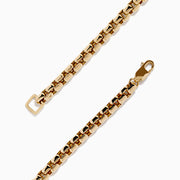 The Men’s 14K Yellow Gold Black Diamond Bracelet features rectangular links set with small black diamonds, forming a sleek and elegant circular design, displayed on a plain white background.