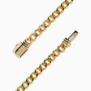 The D'Oro 14K Yellow Gold Diamond Bracelet features a rectangular diamond-accented centerpiece on a gold chain, bordered with additional gems and secured by a sleek cylindrical clasp.